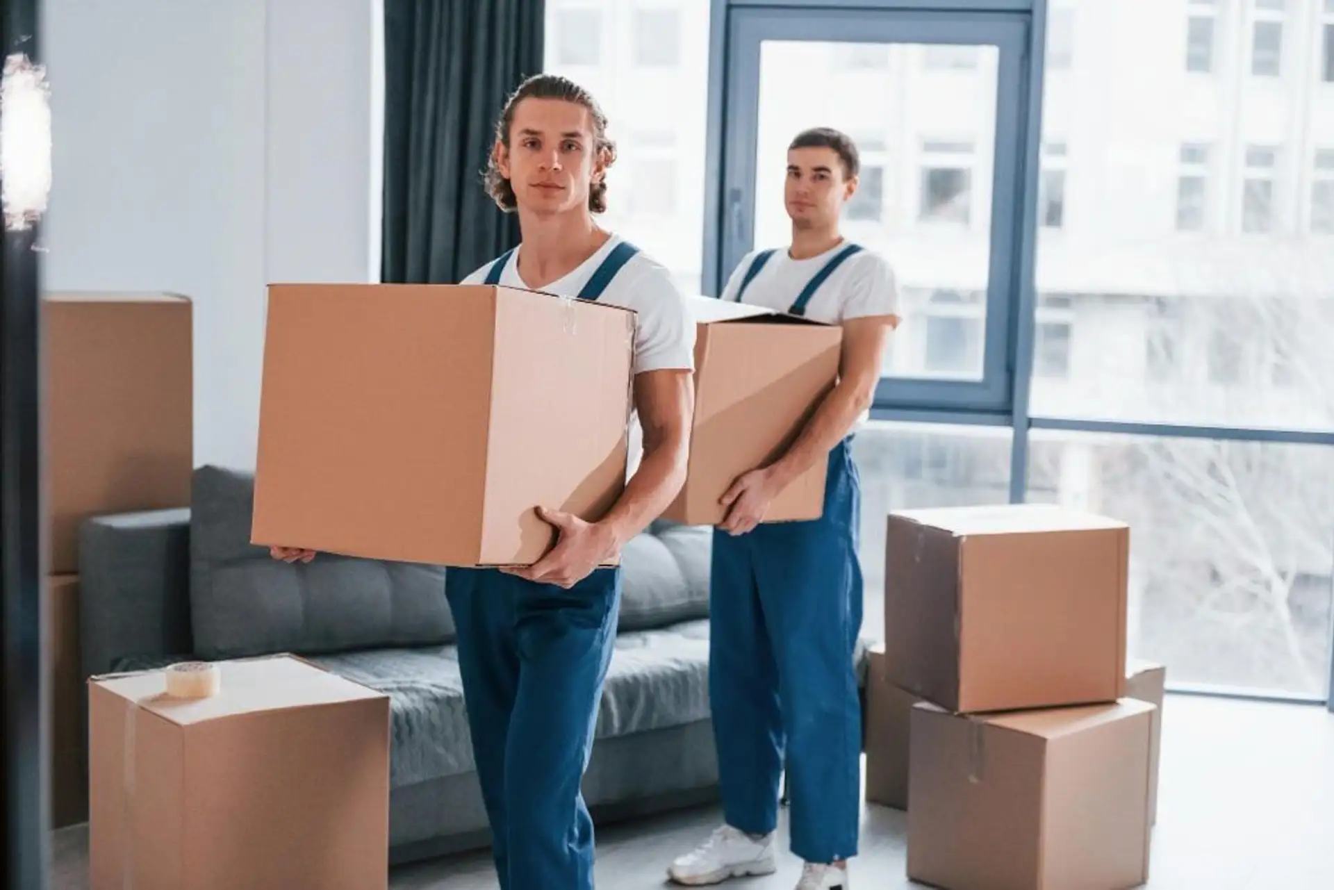 Bulldog Moving crew carrying boxes on a move in Charlotte