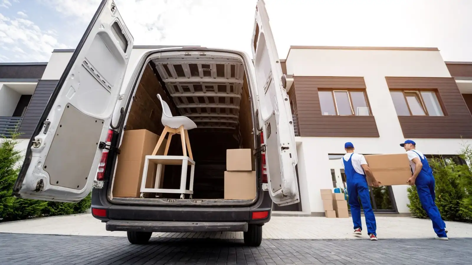 Movers unloading a van in Ballantyne, NC